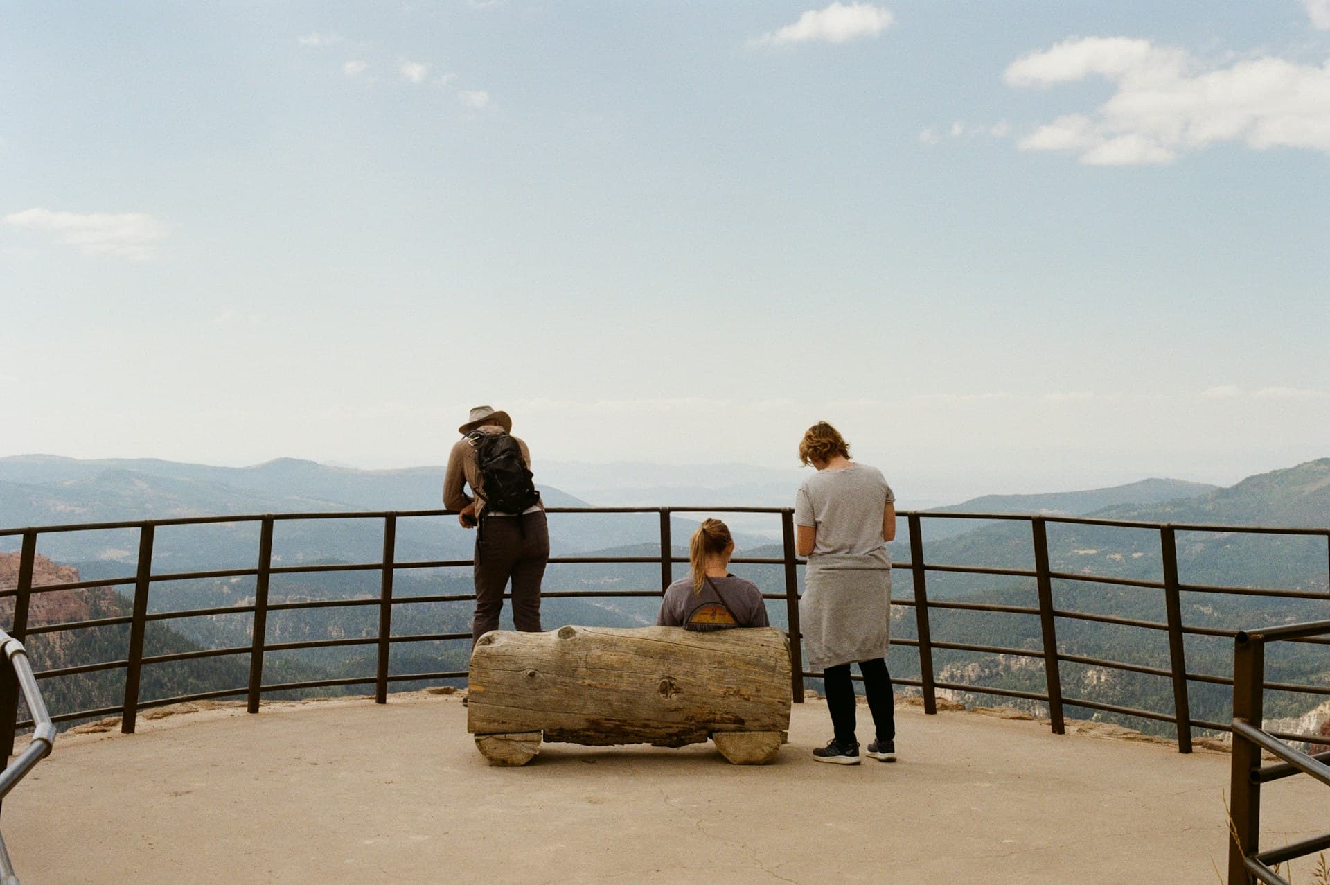 A smooth paved overlook with the Teton Range beyond