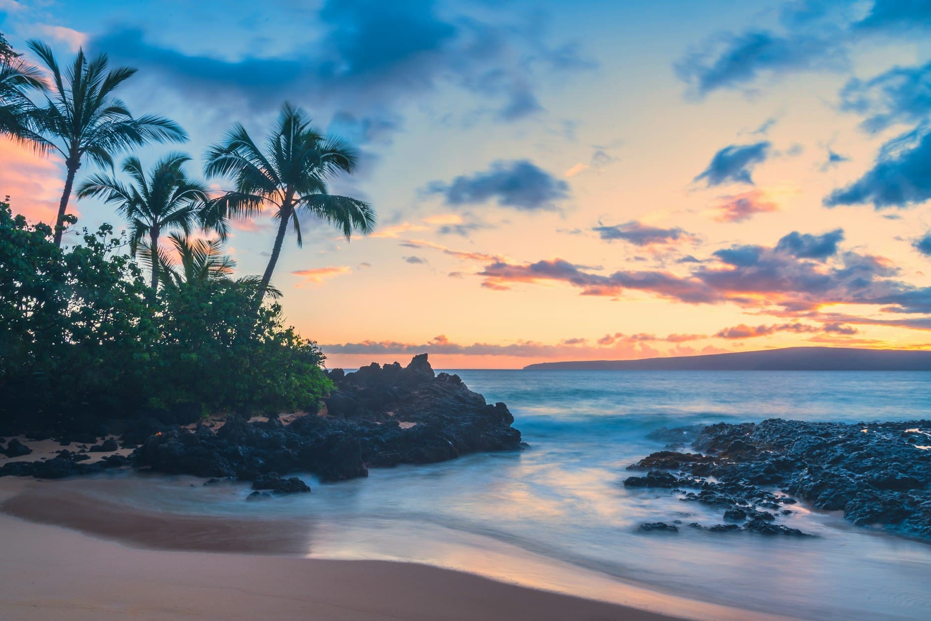 A dramatic Hawaiian coastline at golden hour