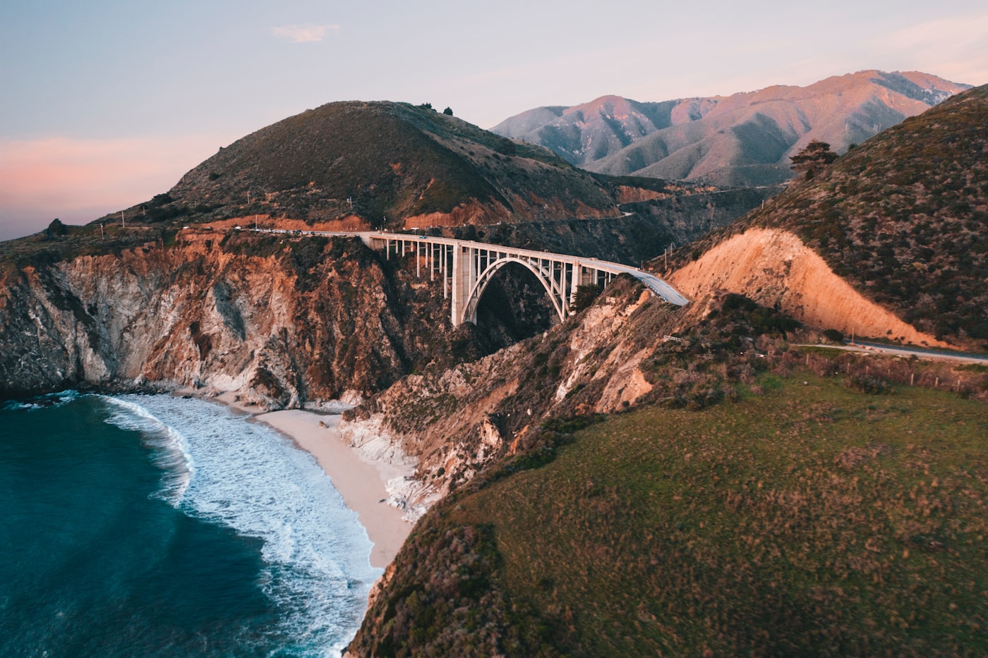 The rugged Big Sur coastline where cliffs meet the Pacific at golden hour